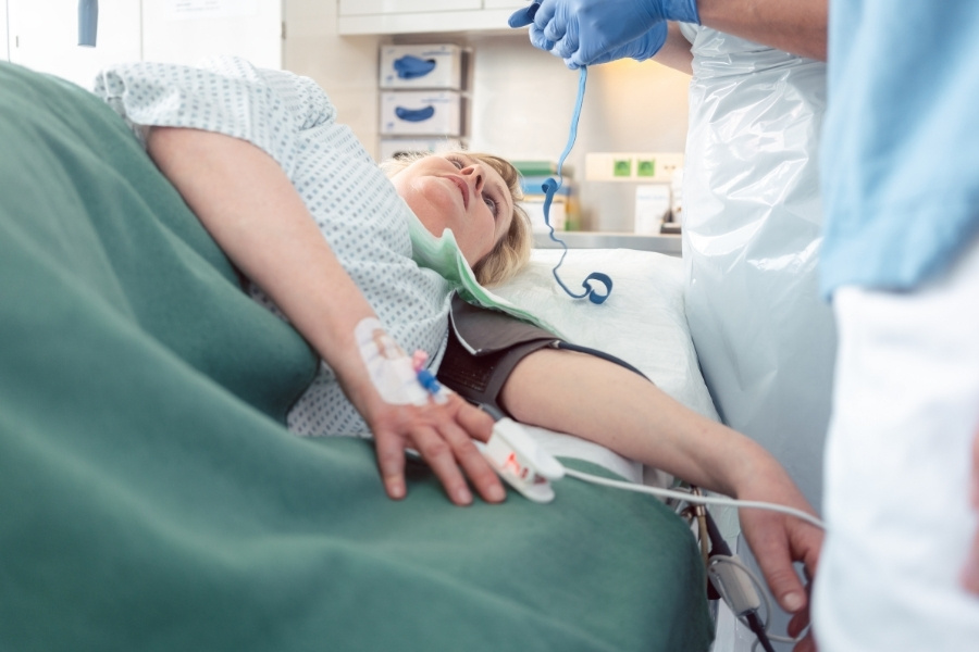 Nurses Preparing Patient for Internal Medicine Examination